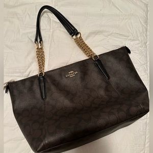 Used coach tote in signature print with gold hardware